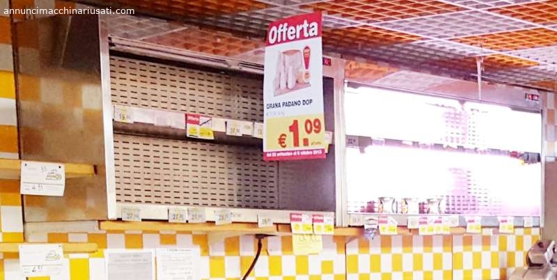 Refrigerated delicatessen cabinet behind the counter