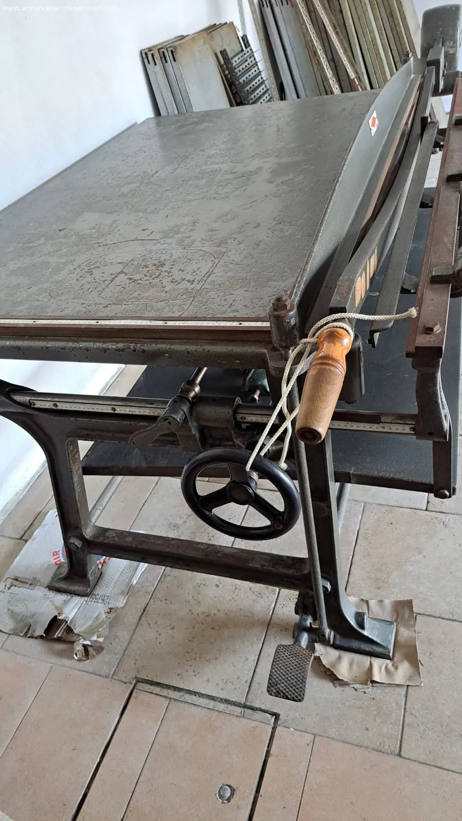 Cutter with roll holder for fabrics and leather